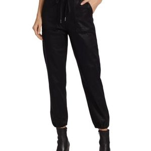 Joe’s coated denim joggers with elastic drawstring waist and bottoms. Price firm